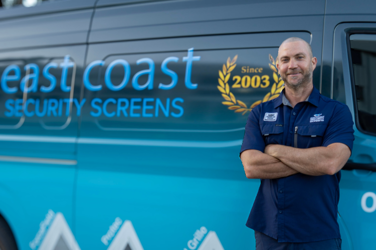 Owner of East Coast Security Screens with company van.
